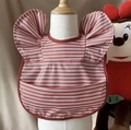 Waterproof baby bib with red stripes and frill sleeves on a mannequin torso - Wings - Burgundy Stripes / One Size