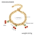 Bracciale in acciaio al titanio dorato con tre ciondoli a ciliegia in vetro rosso e gancio - Bracciale Oro