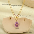 Dettaglio collana doppia dorata con ciondolo a cuore in pietra viola e misure catena - Oro 18K / Stile a Strati