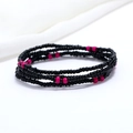 Macro detail of double-layer black and rose red beaded waist chain on white fabric - 80cm / Black/Rose Red