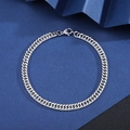 Classic silver stainless steel Cuban link bracelet with lobster clasp on blue background - Double Woven 2-Side Polished Curb [Width 5mm] / Length 21cm