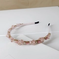 Close-up of pink luxury headband with handmade crystals and sparkling white rhinestones - Style SJ002 / Pink