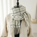 Close-up of soft plaid scarf with tassels on neutral background with warm coffee cup - 200x65cm / Off White