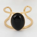 Anello vintage in acciaio al titanio dorato con pietra nera ovale e fascia ondulata - Aperto Regolabile / Largo Svuotato Ovale Pietra Nera / Oro/Nero