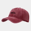Close-up of vintage washed red baseball cap featuring detailed HELLO embroidery - Adjustable / Burgundy
