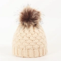 Detail shot of a cream-colored knitted infant hat with a plush dark brown pompom detail - 0-12 Months / Beige