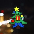 Glittering Christmas tree window sticker with stars and gifts for holiday glass decoration - Christmas Tree