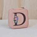 Pink PU jewelry box with floral letter D print and secure zipper closure for accessories - Print D