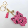 Sparkling rose pink rhinestone cat keychain featuring gold lobster clasp and pink tassel - Rose Red Black Whiskers