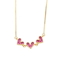 Detailed shot of gold-plated chain with three pavé-set pink heart-shaped pendants - Rose Red
