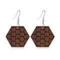 Detail of wooden hexagonal earrings with honeycomb pattern on a clean white background - Style 31