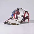 Detail view of a white satin baseball cap featuring luxury golden chain and royal prints - Adjustable / White