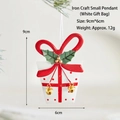 Christmas iron gift box ornament with red bow, holly leaves, and bells in white finish - White Gift Box Iron Ornament