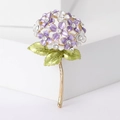 Elegant purple and white enamel hydrangea brooch with rhinestones on a white podium - Purple White