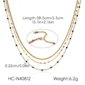 Detail of triple-layer gold stainless steel necklace with round beads and S.Steel stamp - Golden Triple Layered Style (HC-N40812)