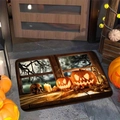 Detail of Halloween diatomaceous earth mat featuring pumpkins and skeletons at doorway - Bronze