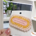 Pink and yellow crochet oval hair clip on a display card for DIY styling - 5# Pink Edge Oval Pink