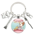 Dental theme keychain with tooth, floss, and toothpaste charms in silver finish - Cartoon Tooth Extraction Scene (3)
