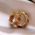 18k gold plated round earrings with champagne diamonds on beige silk fabric - Gold Inlaid Champagne Crystal Metal Earrings