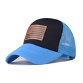 Side view of two-tone mesh trucker hat featuring a monochrome US flag printed on front - Sky Blue & Black