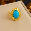 Vintage-Ring aus 18 Karat Gold mit großem blauem Türkisstein in einer beigen Schmuckbox - Ring