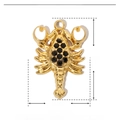 Detail view of a 17x12mm golden scorpion pendant with black rhinestones and enamel inlay - YE672-Black Zircon Scorpion
