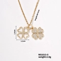 Detail of gold clover necklace showing pavé cubic zirconia and hollow motif pendant - Gold Hollow Clover