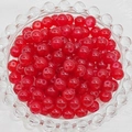 Close-up of 6mm translucent red glass beads for DIY jewelry making in a glass bowl - 4mm / Agate Red