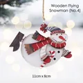 Wooden Christmas snowman hanging ornament with red scarf and candy cane for holiday decor - Wooden Snowman No. 4 (Flying Pose) / 8x11cm