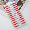 Detail of 12-piece red and white cheerleading friendship bracelets with CHEER letter beads - 12 Pieces / Bright Red
