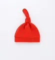 Detail of red newborn baby knotted hat in soft cotton jersey with rolled edge - Red Hat