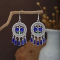 Ethnic silver-finish earrings with blue drop pendants in vintage boho style - Hollow Carved Blue/Green Glaze Tassel Style (E7154)