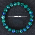 Macro-opname van natuurlijke blauwe K2 steen kralen armband met unieke minerale texturen - K2 Steen Blauw Groen Stijl (Memory-2)