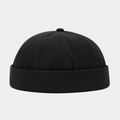 Detail of classic black docker cap showing durable texture and six-panel stitching design - Adjustable / Black