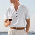 Chemise en lin blanc pour homme avec col mao et boutons contrastés sombres en gros plan - S / Blanc