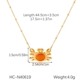 Detail view of gold crab pendant with orange opal stone and beaded necklace chain dimensions - Orange Cat Eye Stone Crab Style (HC-N40619) / Gold