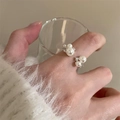 Close-up of elegant double pearl and diamond open ring on a woman's finger - Pearl Zirconia Double Opening Style(JZ0700)