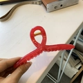 Red 13cm hanger-style hair claw clip with twisted loop design and gold spring - 13cm Hanger Type / Jelly Orange