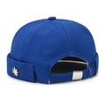 Navy blue docker hat with golden leaf metal emblem and adjustable silver buckle - Sapphire Blue