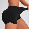 Pantaloncini yoga neri senza cuciture a vita alta con tessuto a costine ed effetto push-up - S / Nero