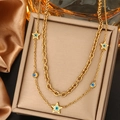 Détail du collier double couche plaqué or 18K avec œil bleu et breloques en étoile - Style Pendentif Étoile et Œil (N-32)