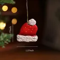Weihnachtsbaumschmuck: Rote Weihnachtsmütze aus Harz mit gelben Punkten und Goldschnur - Weihnachtsmützen-Stil