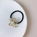Elegant gold hollow flower hair tie with white pearl on a black elastic ponytail holder - GA2841 Gold Hollow Small Flower