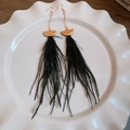 Detail of long black feather earrings with gold arc metal pieces in a ceramic dish - Black Semicircle Gold Disc Feather Drop Earrings (24#)
