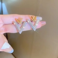 Detail of gold and silver V-shaped earrings with sparkling pavé crystals and star filter - Double Layer V-Shape Gold Plated (25# Silver Pin-Gold Plated-Silver)