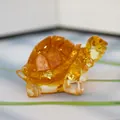 Turtle figurine made of transparent yellow resin with gold leaf flakes inside - Citrine + Gold Foil
