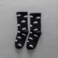 Women's crew socks in black featuring knit cloud patterns and ribbed cuffs - One Size / Black