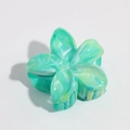 Close-up of a floral hair claw clip featuring green marble patterns and glossy finish - 6cm Blue Green