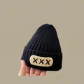 Winter black knit beanie for kids with XXX embroidery and warm ear protection - Xxx Hat Black (for Ages 2 Months To 2 Years)