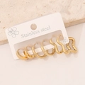 Detailed set of three pairs of gold stainless steel hoop earrings on a display card - 8# Star